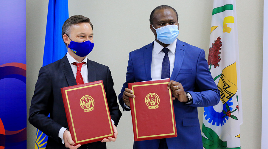 Minister Uzziel Ndagijimana and Jeremie Blin, chargÃ© d'affaires of France to Rwanda during the signing ceremony in Kigali yesterday. / Sam Ngendahimana
