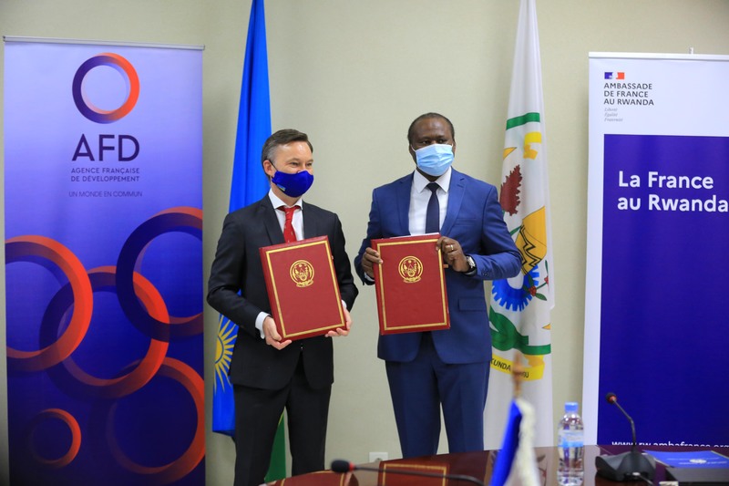 Minister Uzziel Ndagijimana and Jeremie Blin, chargÃ© d'affaires of France to Rwanda during the signing ceremony in Kigali yesterday. / Sam Ngendahimana