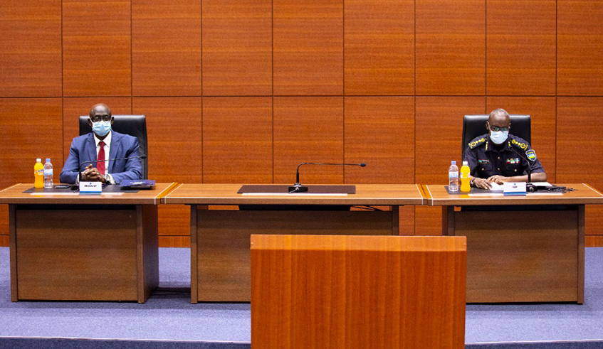 Minister Busingye and IGP Dan Munyuza during the event to see off officers who have been retired from Rwanda National Police on Tuesday, June 30. / Photo: Courtesy.
