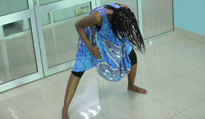 Grace Ingabire does a dance routine the interview at The New Times offices. / Photos by Olivier Mugwiza