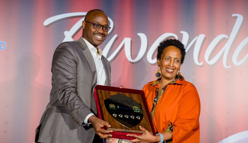 Jacqui Sebageni receiving the Five-Star recognition of Bisate Lodge from City of Kigali Mayor Pudence Rubingisa in November last year. Sebageni has been a major player in Rwandaâ€™s travel and tourism industry.