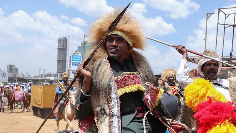 Haacaaluu Hundeessaa rides a horse in traditional costume during the 123rd anniversary celebration of the Battle of Adwa where Ethiopian forces defeated the invading Italian forces, in Addis Ababa last year. 