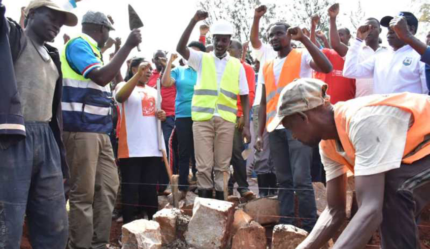 Members of RPF-Inkotanyi lay a foundation stone for the construction of an office building in Gatsibo District in 2019. / Photos by Jean de Dieu Nsabimana