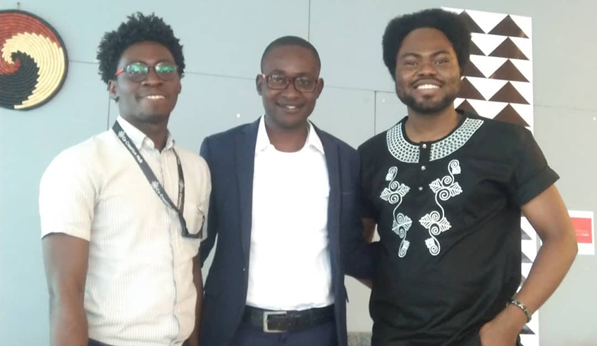 Executive Director of Africa Blockchain Institute, Kayode Babarinde (centre) poses with workmates. / Courtesy.