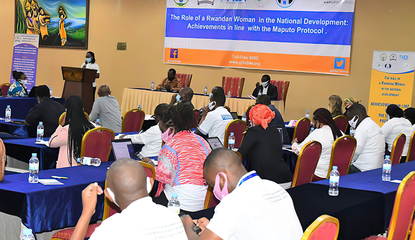 Participants discuss the role of a Rwandan woman in national development. / Photo: Courtesy.