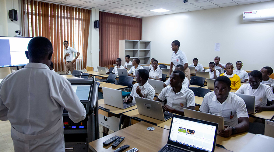 A teacher during IT class at College St Andre Nyamirambo. 