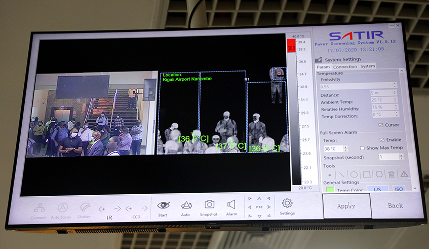 A screen on which passangers can easily find themselves their temperature after being screened by cameras A screen on which passangers can easily find themselves their temperature after being screened by cameras
