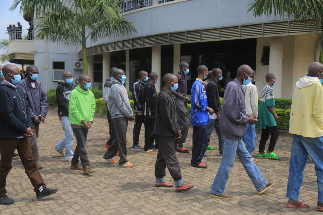 Some of the 57 suspects caught in acts of subversion against the country paraded before the media in Kigali yesterday. / All photos by Craish Bahizi