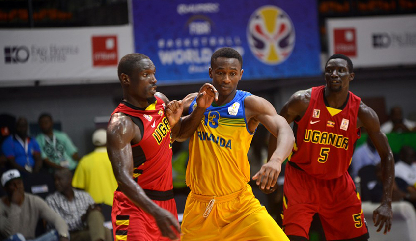 Kaje (C) against Ugandan players in a past game during the qualifiers for the 2019 Fiba World Basketball Cup  Fiba.