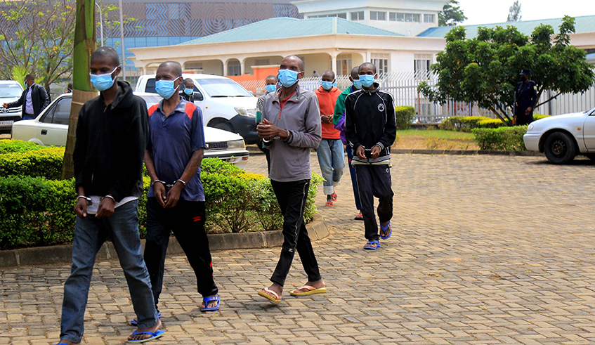 Some of the 57 suspects caught in acts of subversion against the country paraded before the media in Kigali yesterday. / All photos by Craish Bahizi