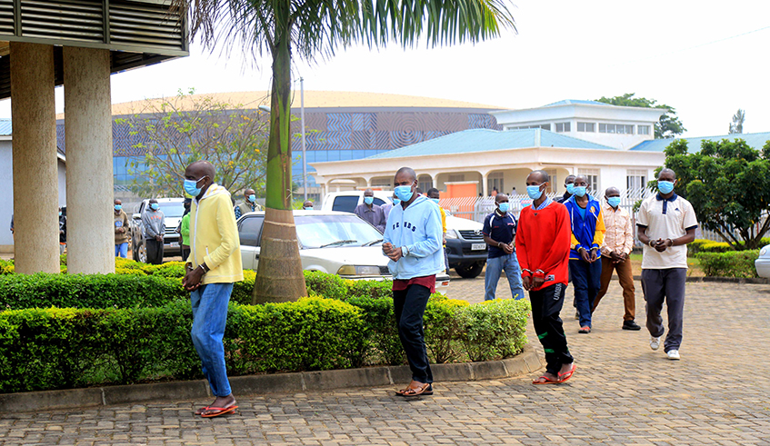 Some of the 57 suspects caught in acts of subversion against the country paraded before the media in Kigali yesterday. / All photos by Craish Bahizi