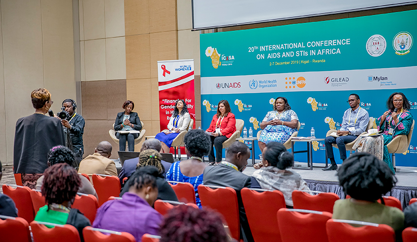 A delegate poses a question to panelists during the 20th International Conference on AIDS in Africa that was held in Kigali in December 2019. Due to Covid-19, Rwanda has lost US $48 million in cancelled meetings. / Photo: Sam Ngendahimana.