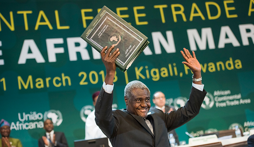 Moussa Faki Mahamat, the Chairperson of the African Union Commission, in a cheerful mood after the launch of AfCFTA on March 21, 2018 in Kigali. / Photo: File.