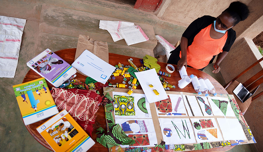  Josiane Ingabire orgainising the learning materials she uses for her programmes.  / Photos by Willy Mucyo