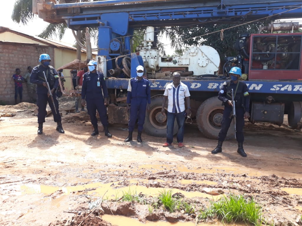 Rwanda Police keeping force and Bangui officials during the official groundbreaking ceremony for the construction of the boreholes. / Courtesy