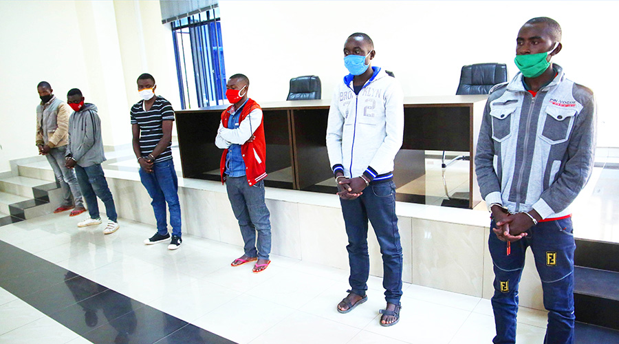 Suspects who were arrested in Kigali over mobile money fraud paraded before the media last week. 