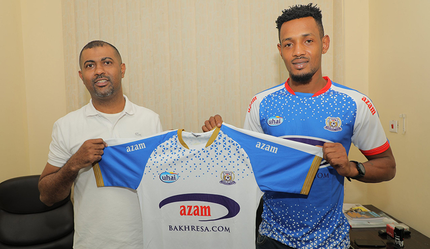 Ally Niyonzima (R), seen here after inking a two-year deal on Saturday, previously played for local heavyweights APR and Rayon Sports in the Rwanda Premier League. / Courtesy