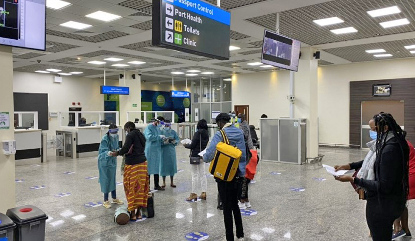 Passengers have their documents inspected by airport staff at Kigali International Airport on Saturday, August 1. / Photo: Courtesy.