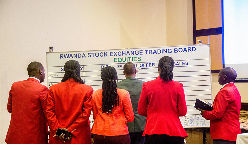 Rwanda Stock Exchange staff during trading earlier this year. / Photo: File.