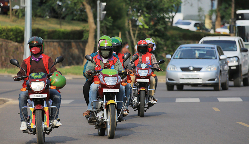 Motor drivers at Gishushu in Kigali. Kigali based taxi-motos to use cashless payments from Mid-August . / Sam Ngendahimana