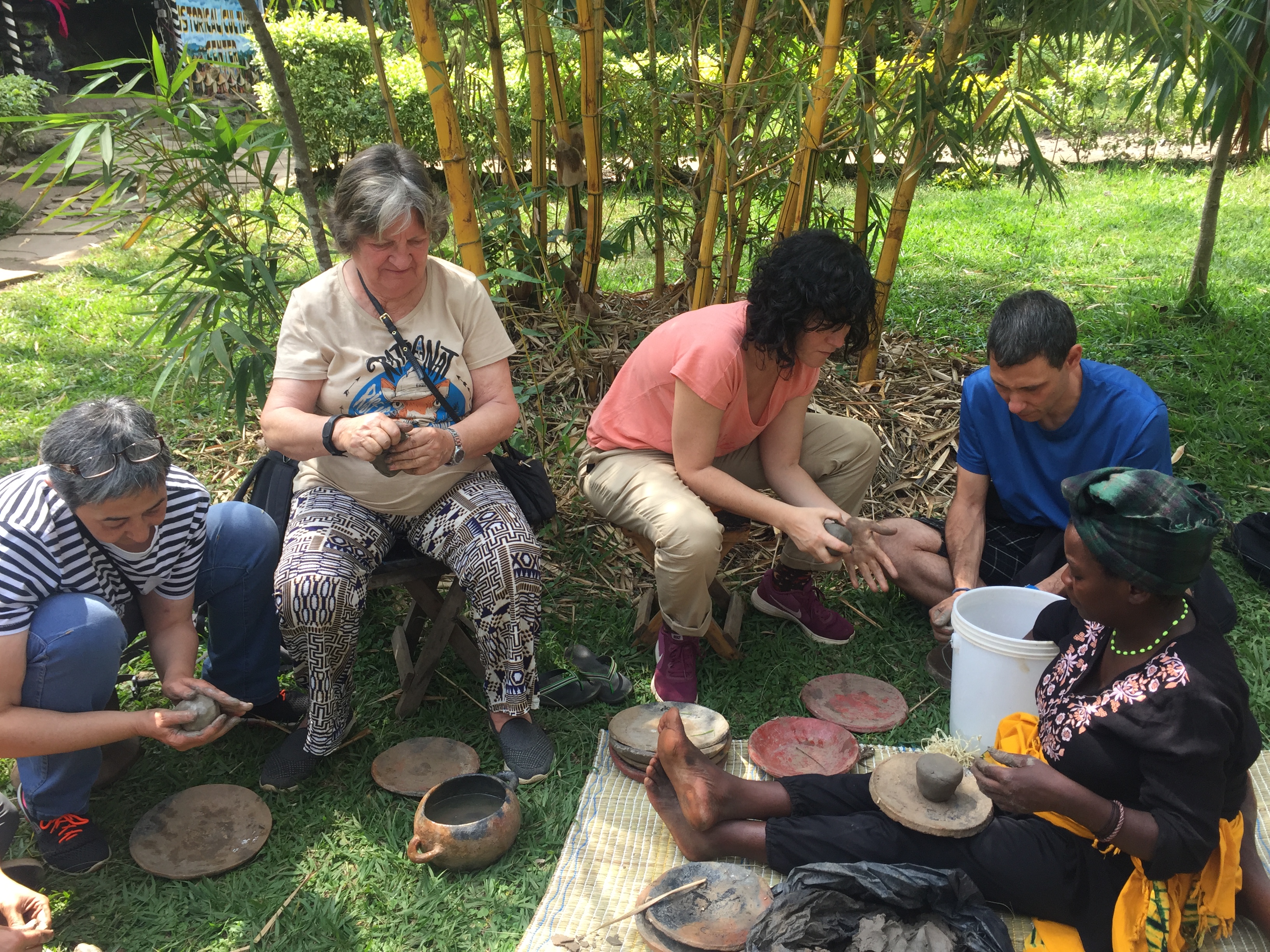 Tourists try their hands on pottery.