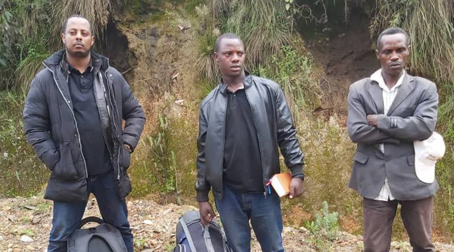 Kizito Mihigo (L) was apprehended trying to escape by local farmers in Nyaruguru in February, 2020. 