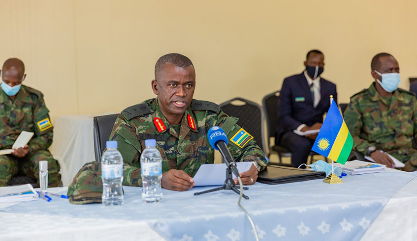 Brig. Gen. Vincent Nyakarundi (centre), the Head of Defence Intelligence at the Rwanda Defence Force (RDF) and his Burundian counterpart Col Erneste Musaba (right) and the facilitator, Col Leon Mahoungou, the Commander of the Expanded Joint Verification Mechanism shortly before the meeting between the two countries at Nemba One-Stop Border Post on Wednesday, August 26. / Photo: Courtesy.