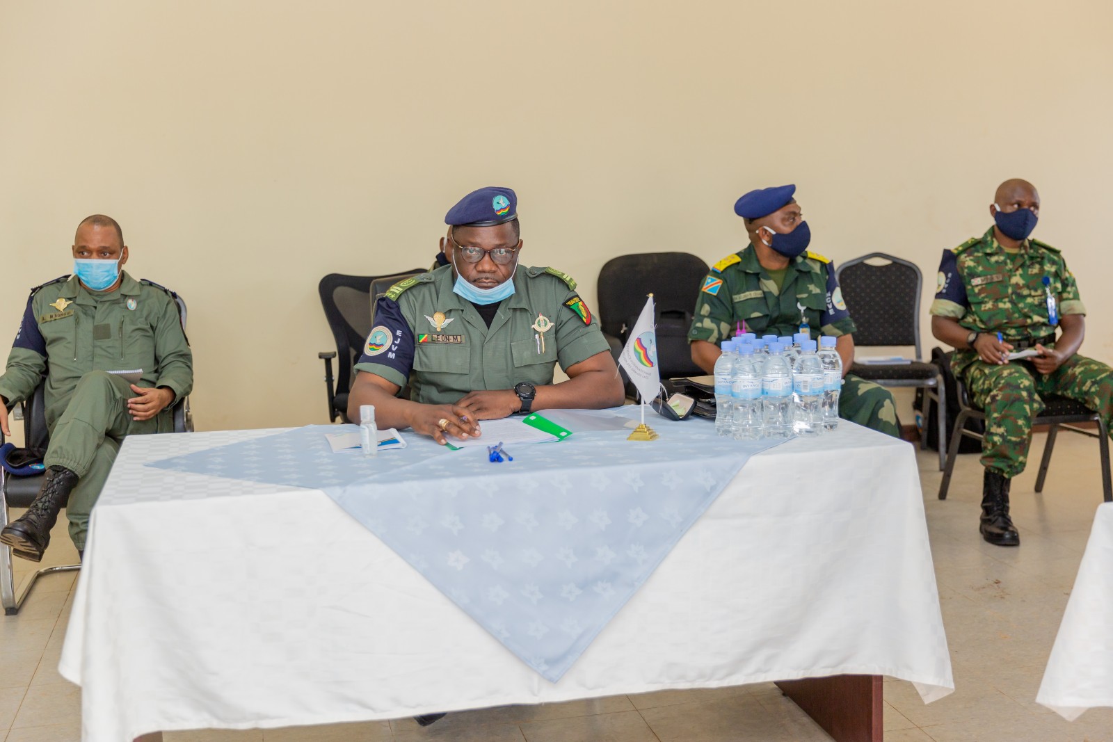 Brig. Gen. Vincent Nyakarundi (centre), the Head of Defence Intelligence at the Rwanda Defence Force (RDF) and his Burundian counterpart Col Erneste Musaba (right) and the facilitator, Col Leon Mahoungou, the Commander of the Expanded Joint Verification Mechanism shortly before the meeting between the two countries at Nemba One-Stop Border Post on Wednesday, August 26. / Photo: Courtesy.