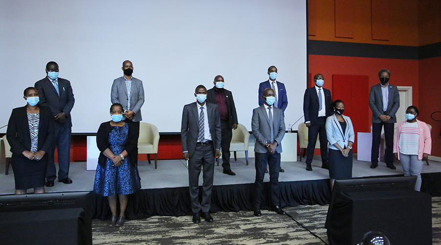 Officials pose for a group photo during the launch of a five-year strategic plan of  Rwanda Cooperative Agency in Kigali yesterday. 
