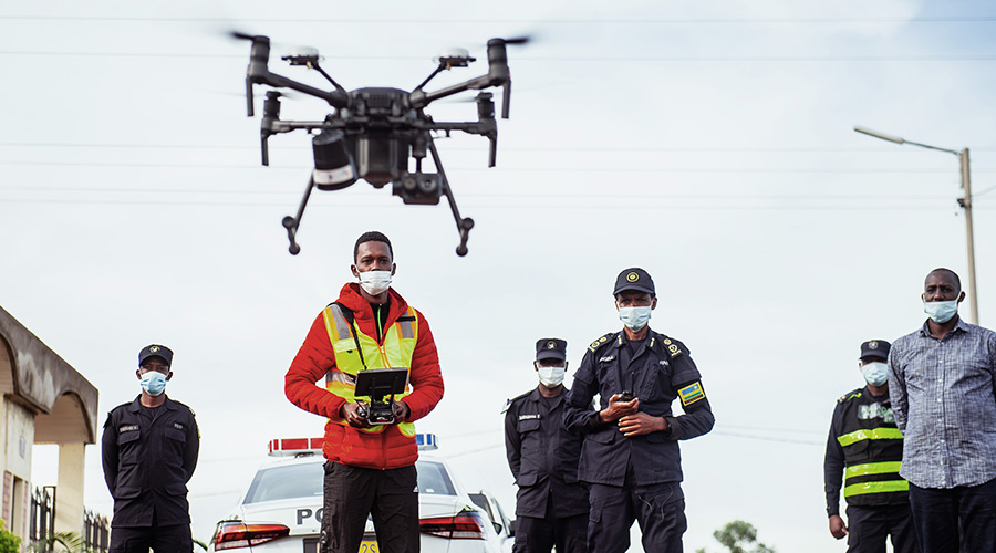 Police officers during the launch of using drones to disseminate instructions on Covid-19 preventive measures in April. 