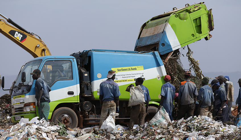 Workers sort garbage at Nduba dump site in Gasabo District. The proposed project will feature smart dustbins and smart waste stations. / Photo: Sam Ngendahimana. Workers sort garbage at Nduba dump site in Gasabo District. The proposed project will feature smart dustbins and smart waste stations. / Photo: Sam Ngendahimana.
