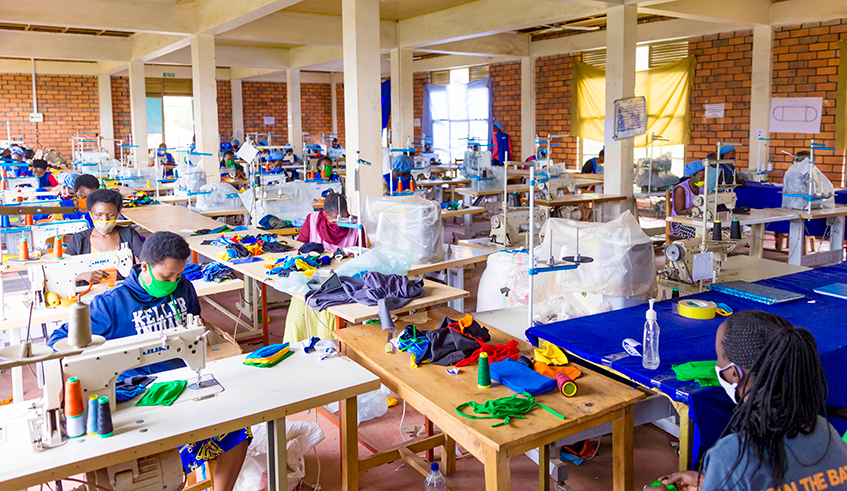 Workers make face masks at New Kigali Designers factory. / Photo: Courtesy.