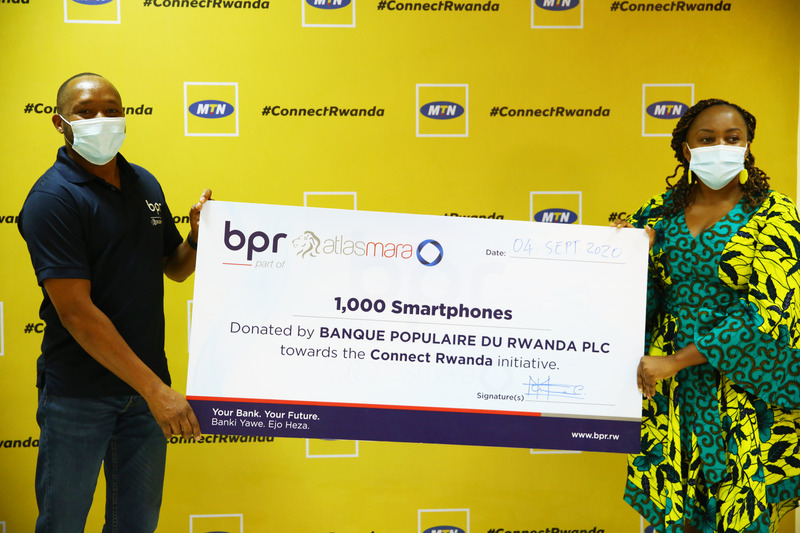 BPR Managing Director Maurice Toroitich hands over a cheque to MTN Rwanda CEO Mitwa Kaemba Ng'ambi on 4 September 2020. / All photos Sam Ngendahimana