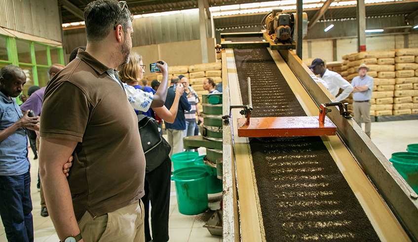 Visitors during a guided tour inside Pfunda Tea Company factory in Rubavu District. / Photo: File.
