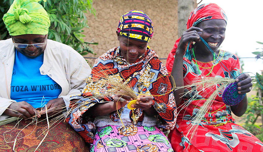 Women weave Rwandan traditional baskets u2018Agasekeu2019 from different plants in Musanze District. / Photo: File.