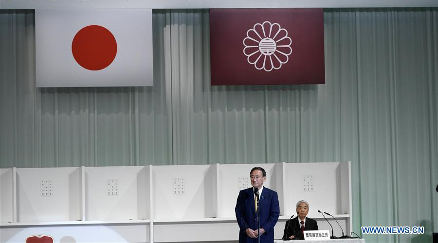 Japanese Chief Cabinet Secretary Yoshihide Suga makes a speech after his election as new president of Japan's ruling Liberal Democratic Party (LDP). 