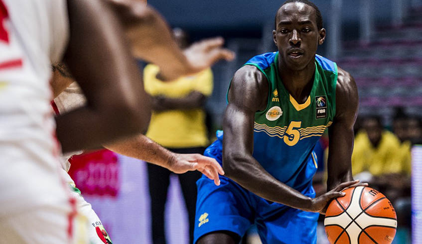 Rwanda international Dieudonne Ndizeye is seen in action against Guinea during the last edition (2017) of the African Basketball Championship co-hosted by Senegal and Tunisia. / Net