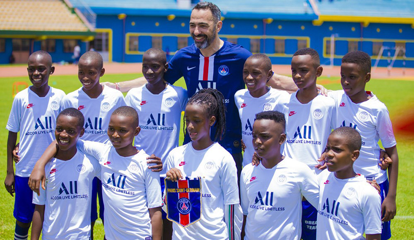 PSG legend Youri Raffi Djorkaeff visited the country earlier this year and trained with a group of youngsters at Amahoro Stadium. / Courtesy