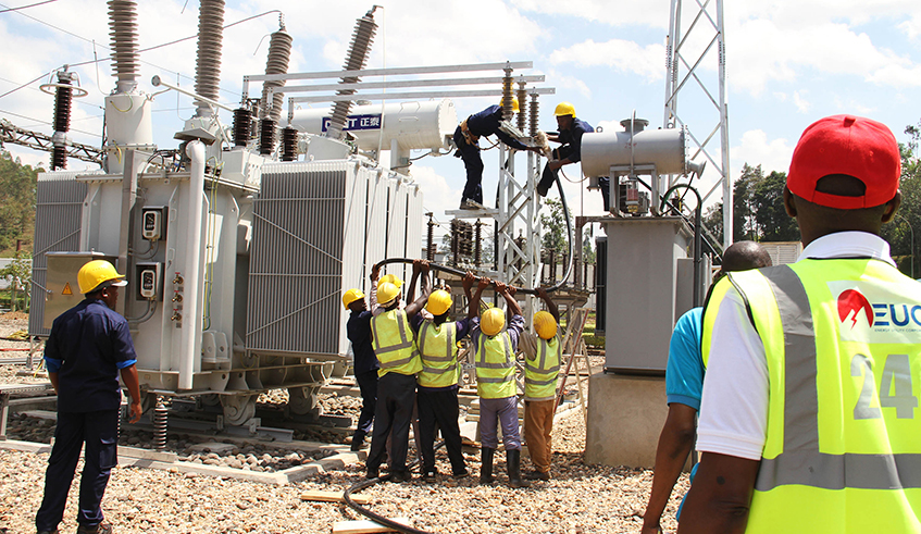EUCL workers during maintainance activities at Mukungwa Hydropower plant in Burera District in June 2019. / Photo: Sam Ngendahimana.