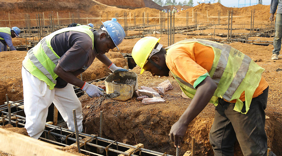 Builders working on a construction project in Kigali. According to the Rwanda Institute of Architects, there are only 130 certified architects in the country and that majority of them shun the professional body due to stringent guidelines that they are obliged to follow. 