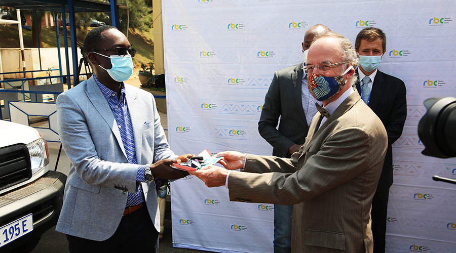 Benoit Ryelandt, Belgian ambassador, hands over to Minister of Health Dr. Daniel Ngamije 40 ambulances in Kigali on 24 September 2020. 