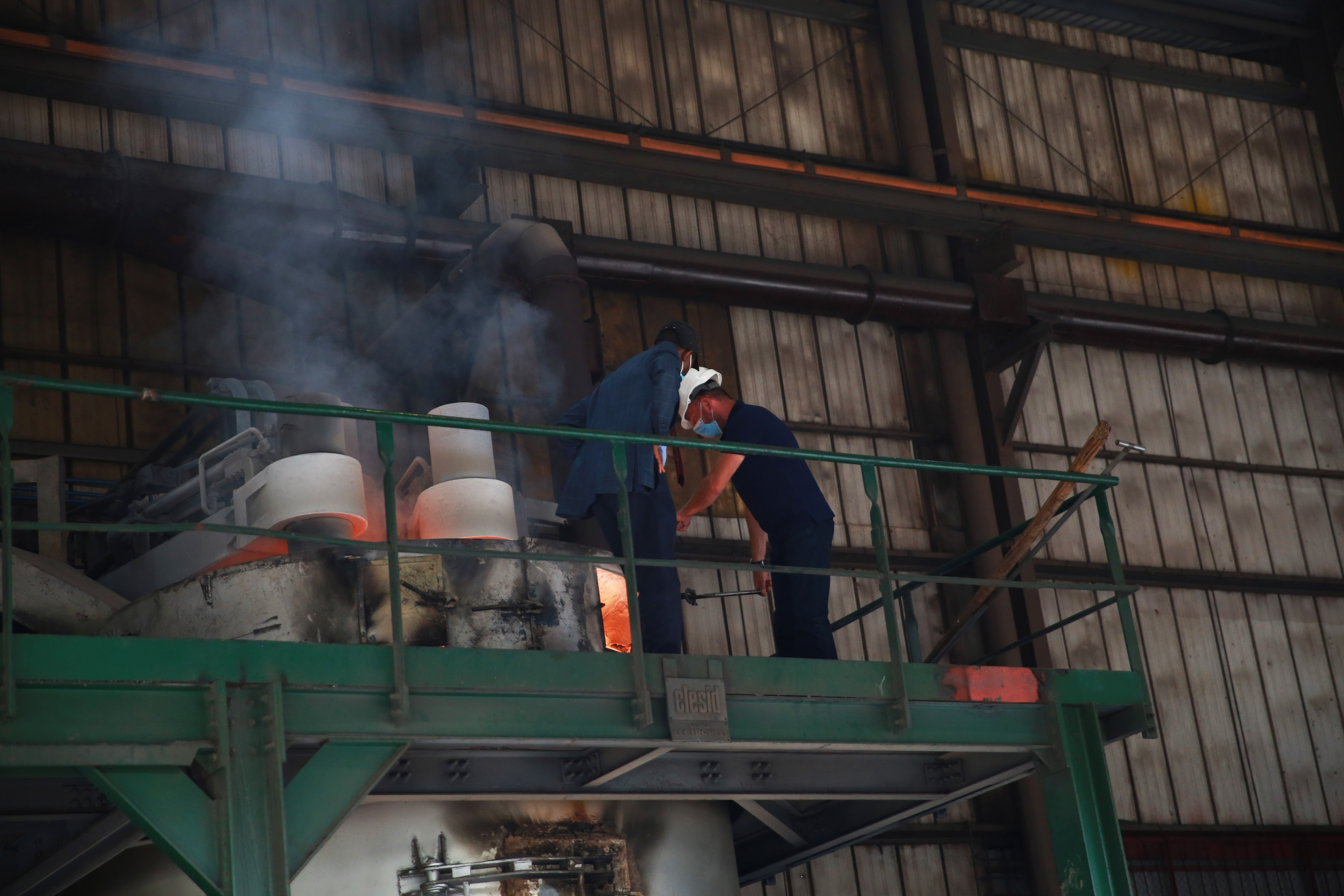 Chef Executive Officer of the Rwanda Mines, Petroleum & Gas Board Francis Gatare during his guided tour inside  LuNa Smelter in Kigali on 22 September .Sam Ngendahimana