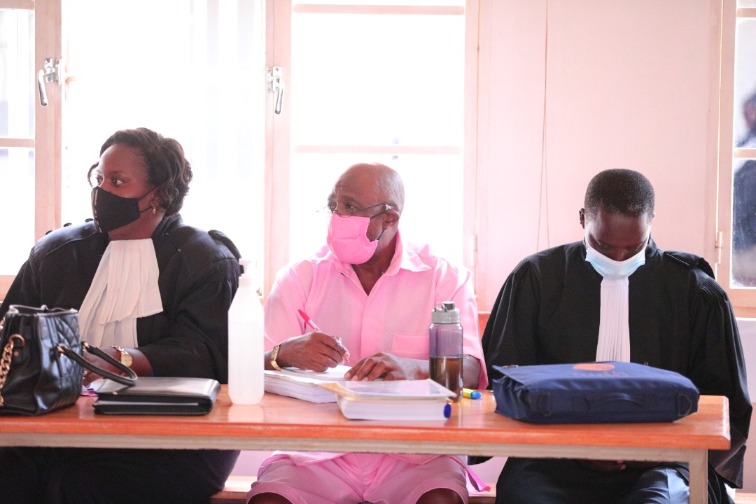 Paul Rusesabagina with his lawyers at Nyarugenge Intermediate Court in Nyamirambo on Friday, September 25. 