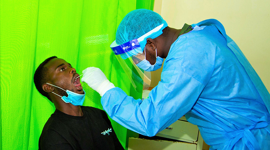 APR midfielder Djabel Manishimwe is seen being tested for Covid-19 on Tuesday, September 29. Teams, in all sports, have been urged to get tested their players before resuming training and competitions.