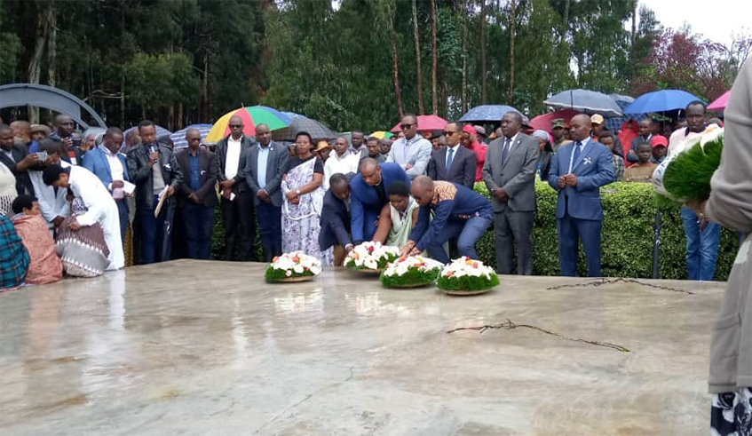 Mourners laying wreaths on a mass grave in honour of Genocide victims laid to rest at Kinigi Genocide Memorial in Musanze District. / Courtesy 