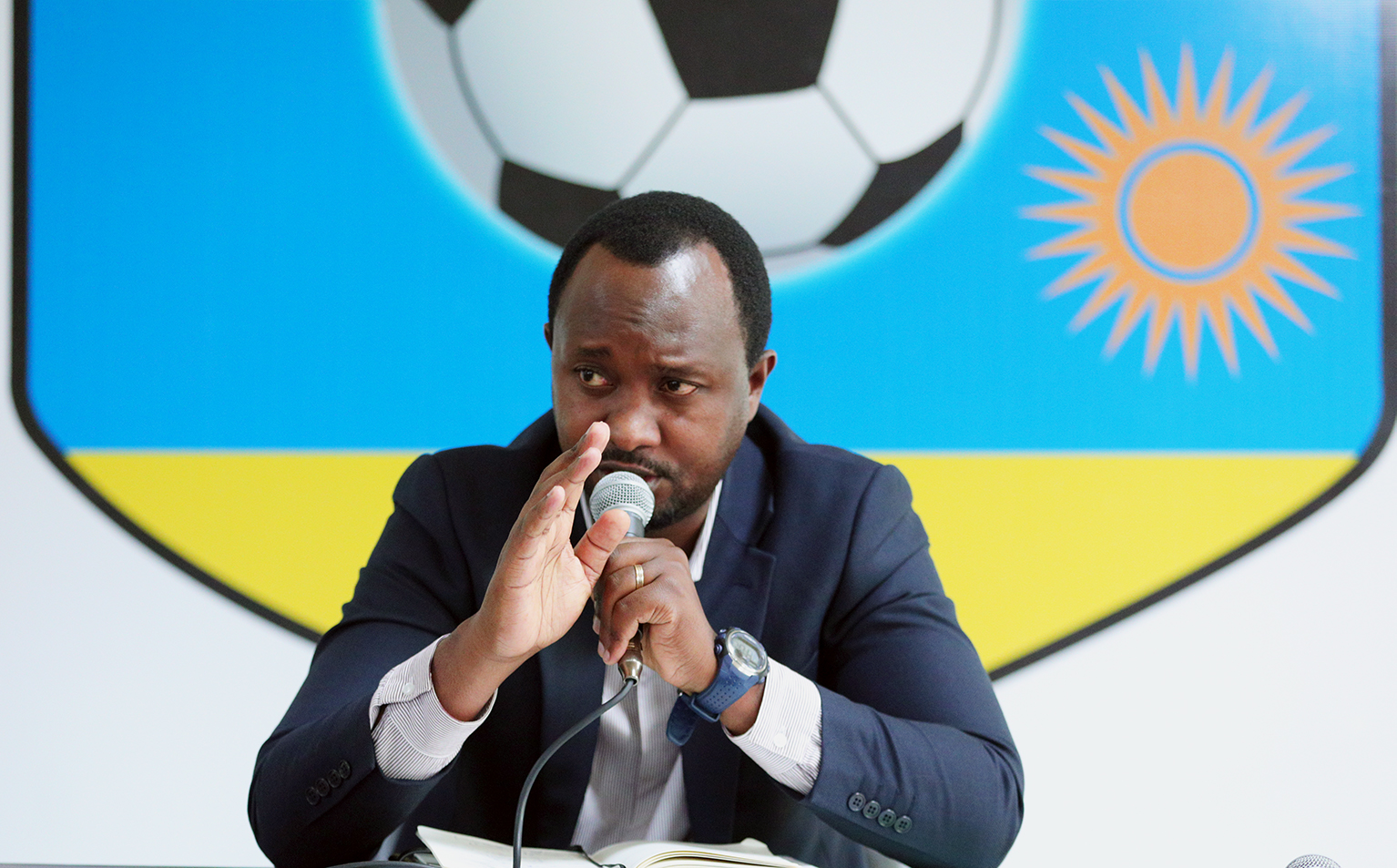 Vincent Mashami speaks to members of the press at Ferwafa headquarters on Wednesday, October 7, as he announced his Amavubi squad for Rwandaâ€™s double-header against Cape Verde. / Photo: Oliver Mugwiza.