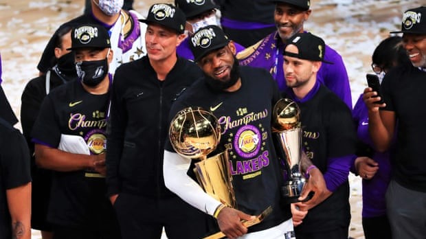 LeBron James with the NBA trophy and NBA finals MVP award after the Lakers clinched their 17th title. 