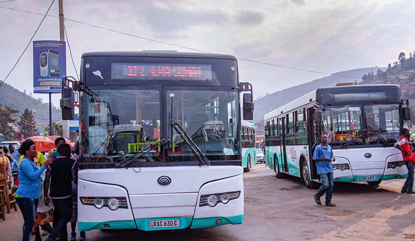 Passengers board a bus at Nyabugogo Taxi Park. Public transport Generation 2 will be put on hold until further notice due to the adverse effects that Covid-19 has had on operators. / Photo: File.