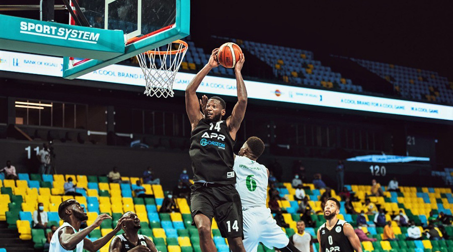 Kevin Ndahiro (sinking in a dunk) was instrumental as he scored 15 points to lift APR to a 78-65 win over IPRC Huye at Kigali Arena on Sunday. 