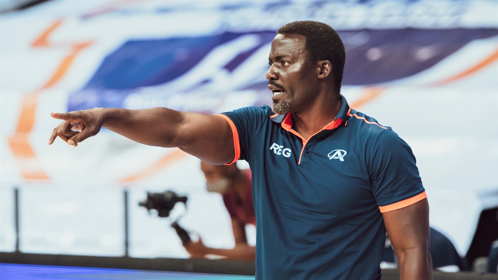 Henry Mwinuka shouts instructions to his REG during their 90-83 win over IPRC Kigali at Kigali Arena on Monday. 